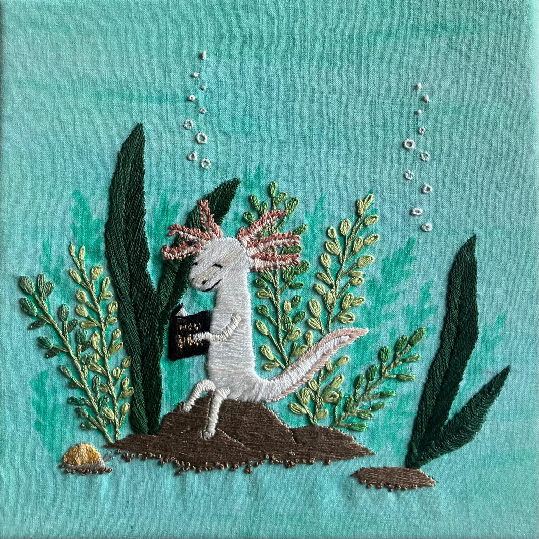 An axolotl reading the Bible
